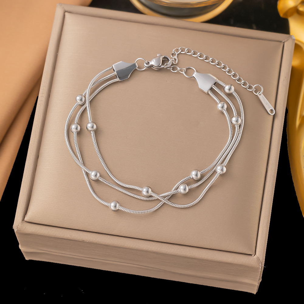 Brazalete Triple Cola de Raton Con Esferas Plateado