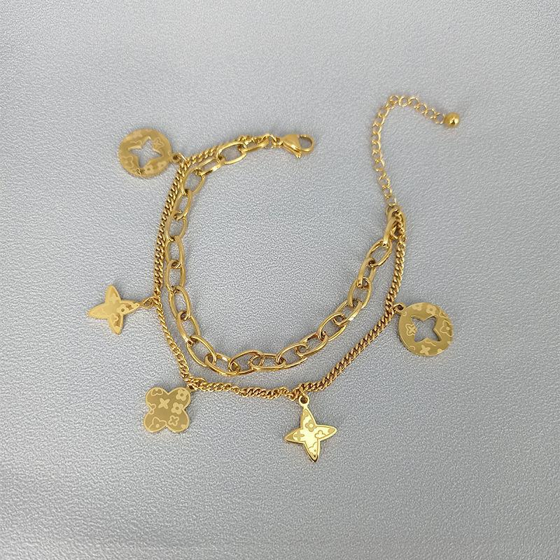 Brazalete Doble Flores Doradas
